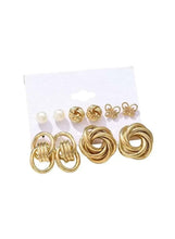 Gold-tone earring set with pearl studs, floral charms, and knotted hoop studs
