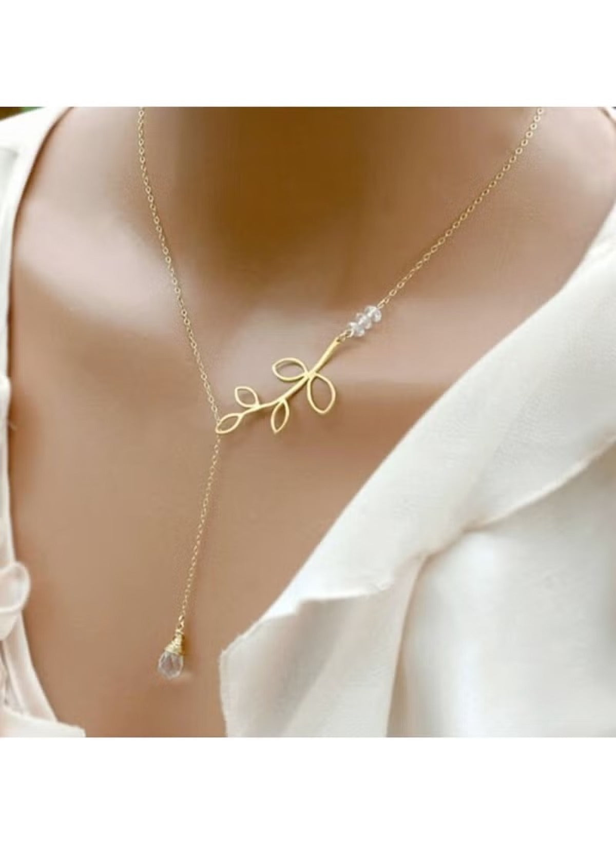 Huitich gold leaf pearl necklace with delicate gold leaves and pearl accents on a fine chain