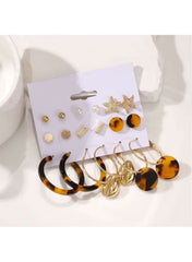 Gold mixed earring set for women featuring tortoiseshell and star motifs on a display card