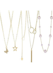 Elegant gold necklace set for women featuring various charms and pearl accents for versatile styling