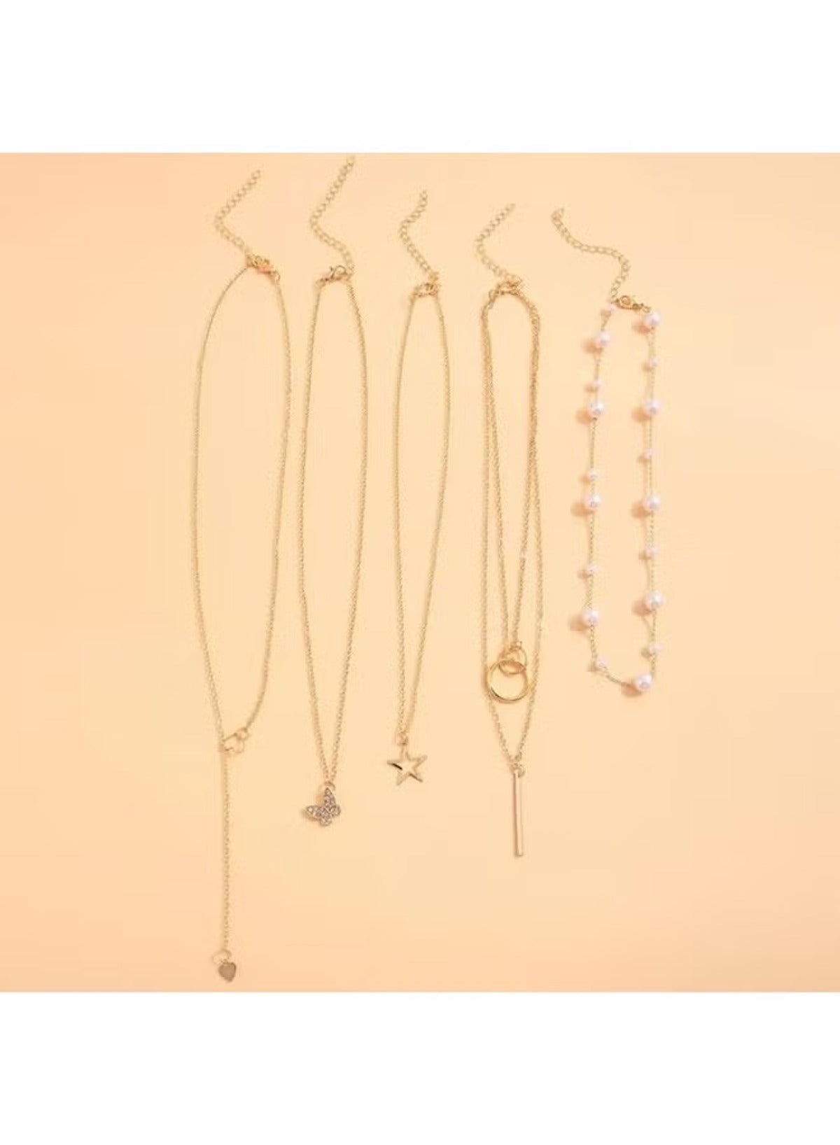 Huitich gold necklace set for women featuring five elegant layered designs with charms