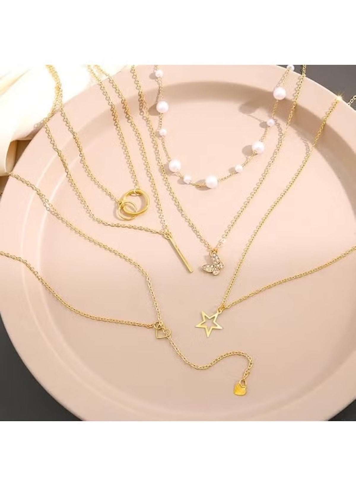Huitich gold necklace set for women featuring layered chains with different charms and beads