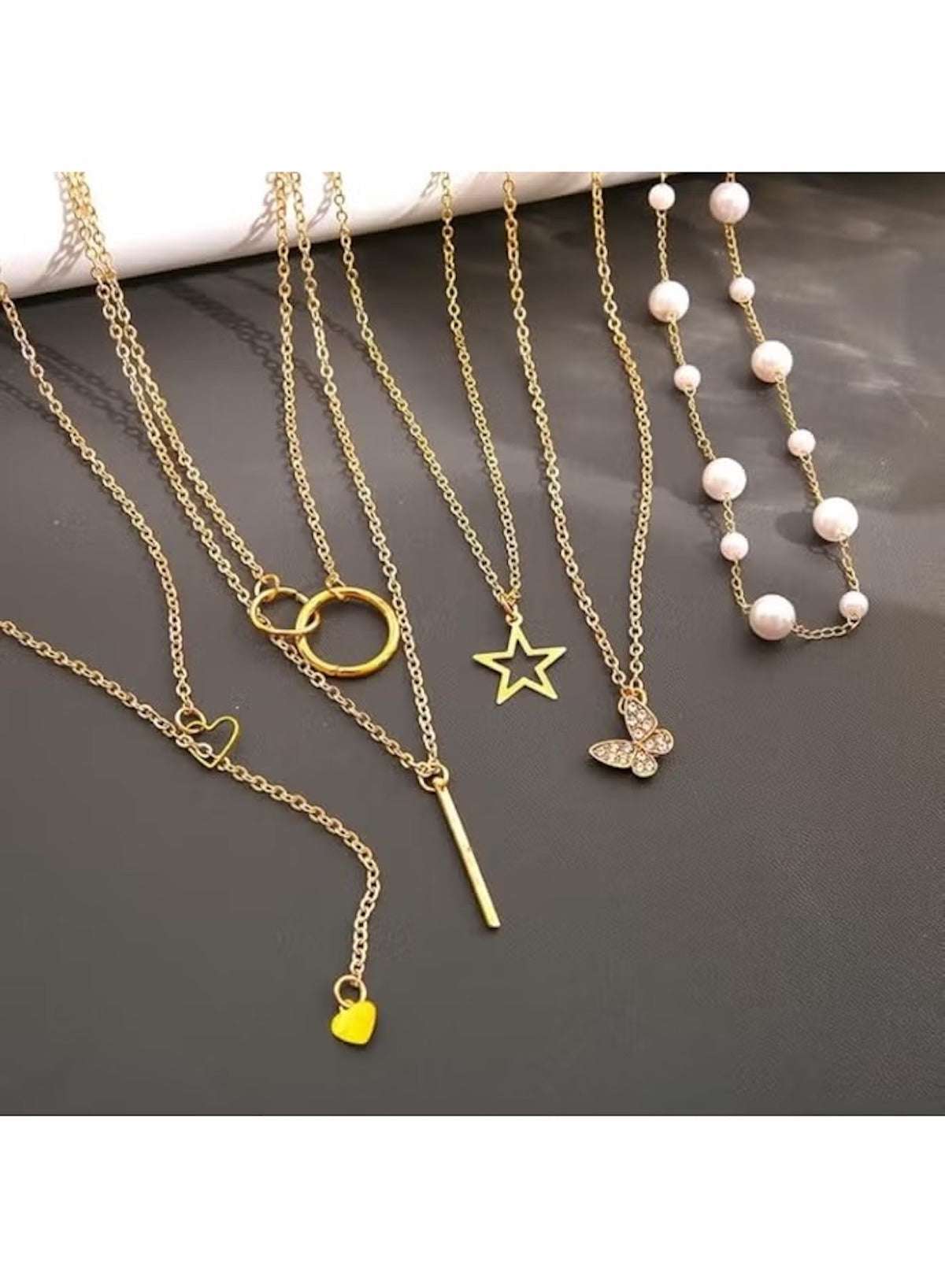 Huitich gold necklace set for women featuring various designs like stars and hearts