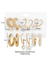 Gold pearl and crystal earring set with mixed hoops, dangling charms, and studs