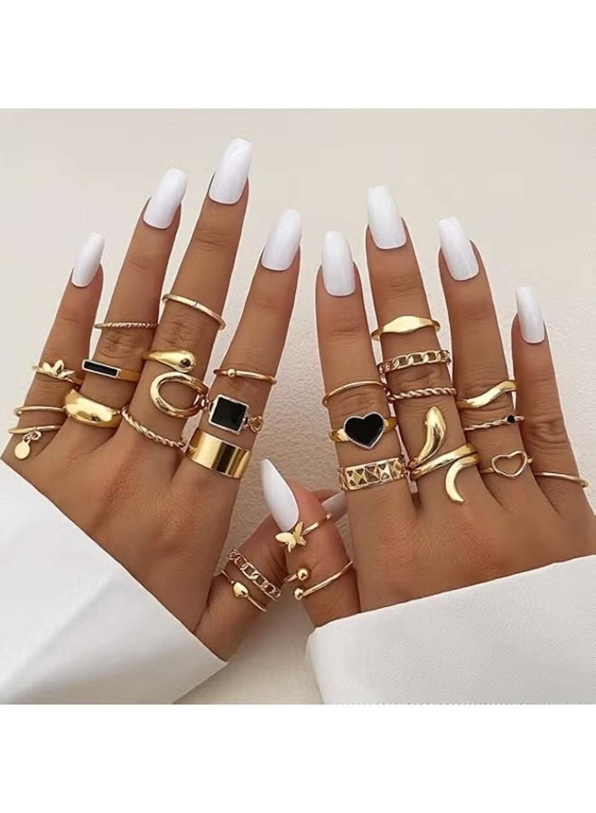 Stylish gold ring set for women featuring various designs and sizes for trendy finger stacking