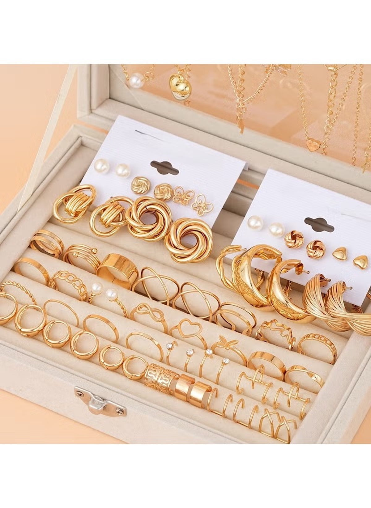 Huitich gold tone jewelry set featuring earrings and rings in elegant swirled and textured designs