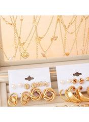 Huitich gold tone jewelry set with layered necklaces and assorted earrings including hoops and studs