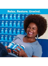 Blue ashwagandha gummies bottles with white caps held by smiling woman