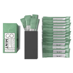 Go Essentials mint travel mouthwash packets box and single serve sachets fanned out showing individual green packets