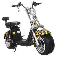 Black electric scooter with graffiti side panels and round front headlight