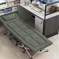 Huitich green folding camping cot with cushioned surface and sturdy frame set up in office space