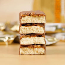 Stack of caramel-coated protein bar slices