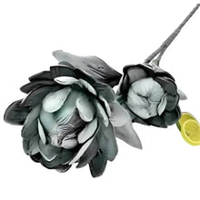 Artificial flower decor: three dark grey blooms with green leaves and stem