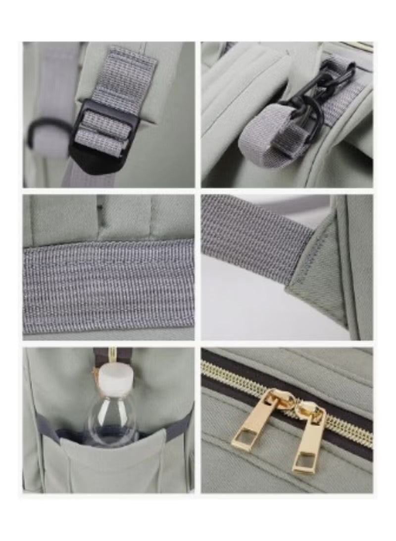 Detailed features of the grey baby travel bag including pockets, straps, and zippers