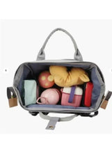 Light grey baby travel backpack open top showing interior compartments
