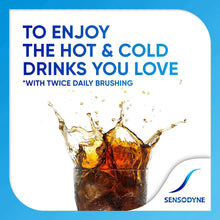 Toothpaste box with hot & cold drinks message and amber drink splash