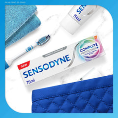 Box and tube of Sensodyne 75ml with toothbrush towel and travel pouch sensodyne toothpaste for sensitive teeth