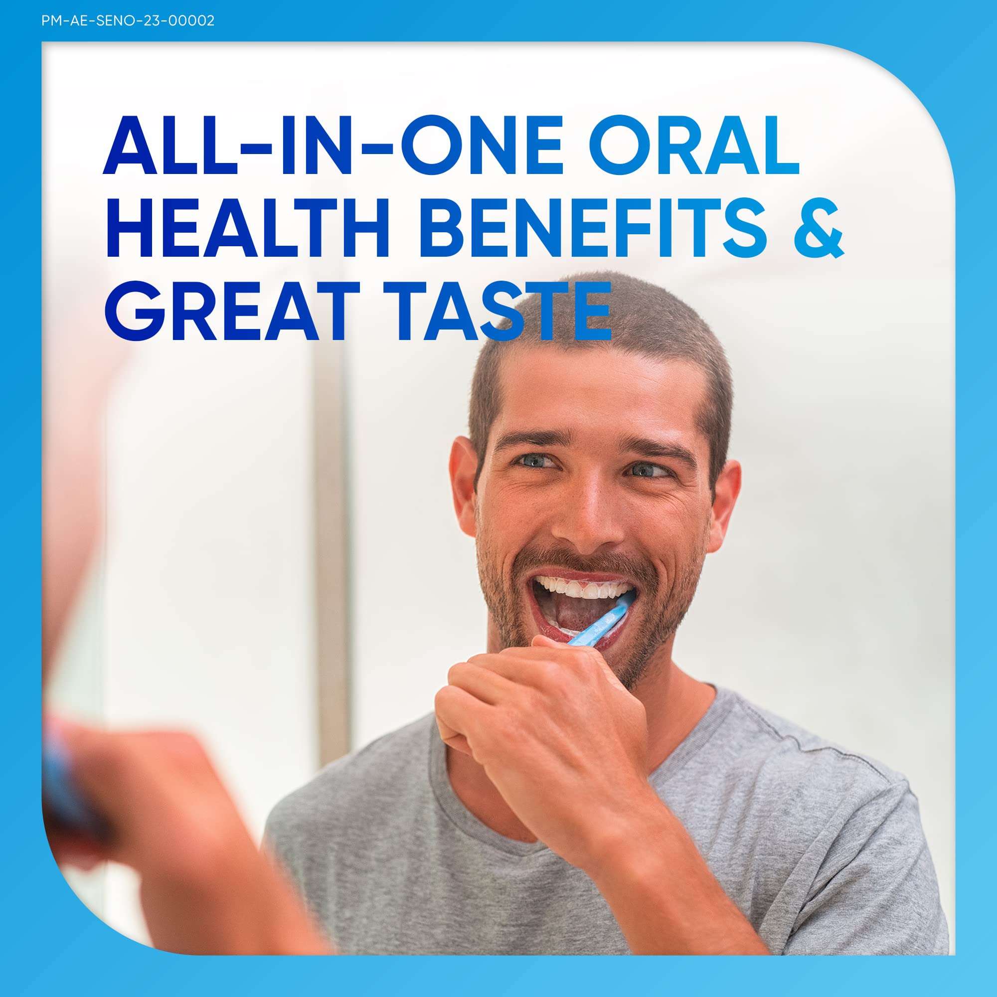 sensodyne toothpaste for sensitive teeth showing man smiling while brushing his teeth in bathroom mirror