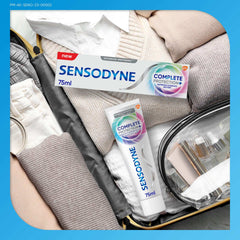 sensodyne toothpaste for sensitive teeth complete protection 75ml tube and box packed in travel suitcase with clothes