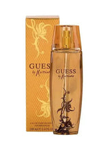 Women's eau de parfum bottle with gold cap and matching ornate box