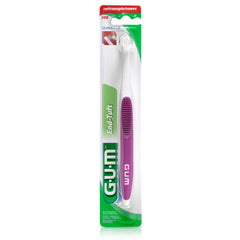GUM end tuft toothbrush for implants with angled small head and purple white handle in blister pack
