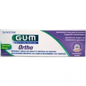 GUM Ortho ortho toothpaste for braces in purple and green box providing enamel and gum protection