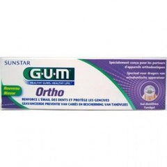 GUM Ortho ortho toothpaste for braces in purple and green box providing enamel and gum protection