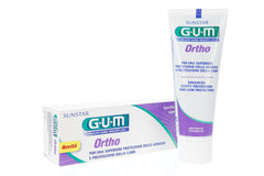 GUM Ortho ortho toothpaste for braces packaged tube and box on white background showing label