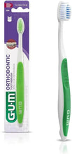 Gum orthodontic microtip toothbrush with soft bristles, compact head, green handle side view