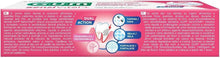 Toothpaste box back panel with small text and tooth diagram, pink and blue graphics