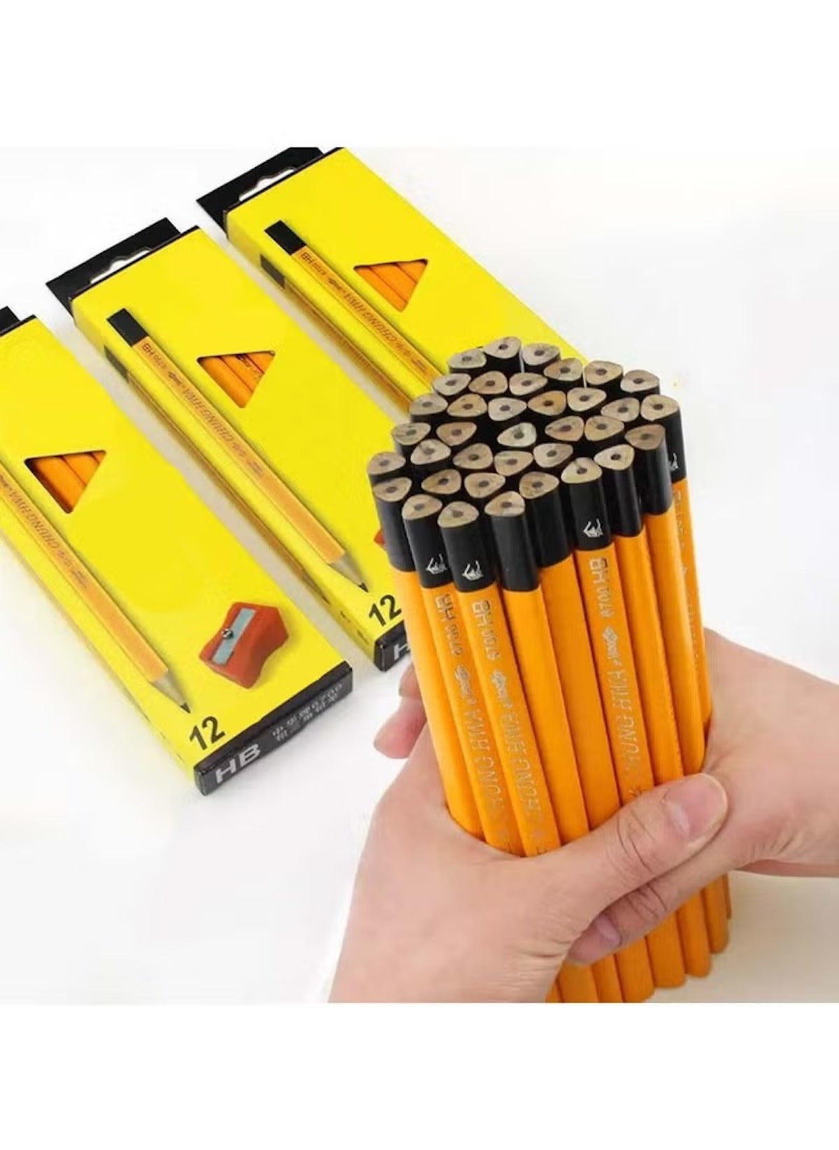 Huitich HB hexagonal wood pencils set with orange wood barrels and black eraser caps held in hand