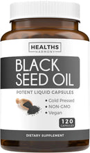Black seed oil supplement bottle with white cap, label shows 120 liquid capsules