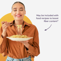 Healthy Origins woman eating noodles smiling holding fork and plate with copy about recipes fiber supplement for gut health