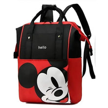 Red and black baby travel backpack with Mickey-style cartoon face and front pocket
