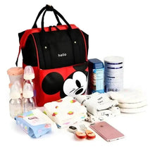 Red and black baby travel backpack with 'hello' logo and cartoon pocket