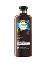 Conditioner bottle with black pump; dark brown bottle and Herbal Essences label