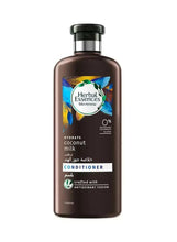 Conditioner bottle with black pump; blue leaf label and dark brown bottle