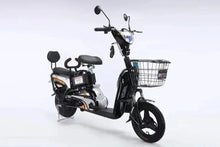 Electric bike side view with wire basket, black handlebars, padded seat