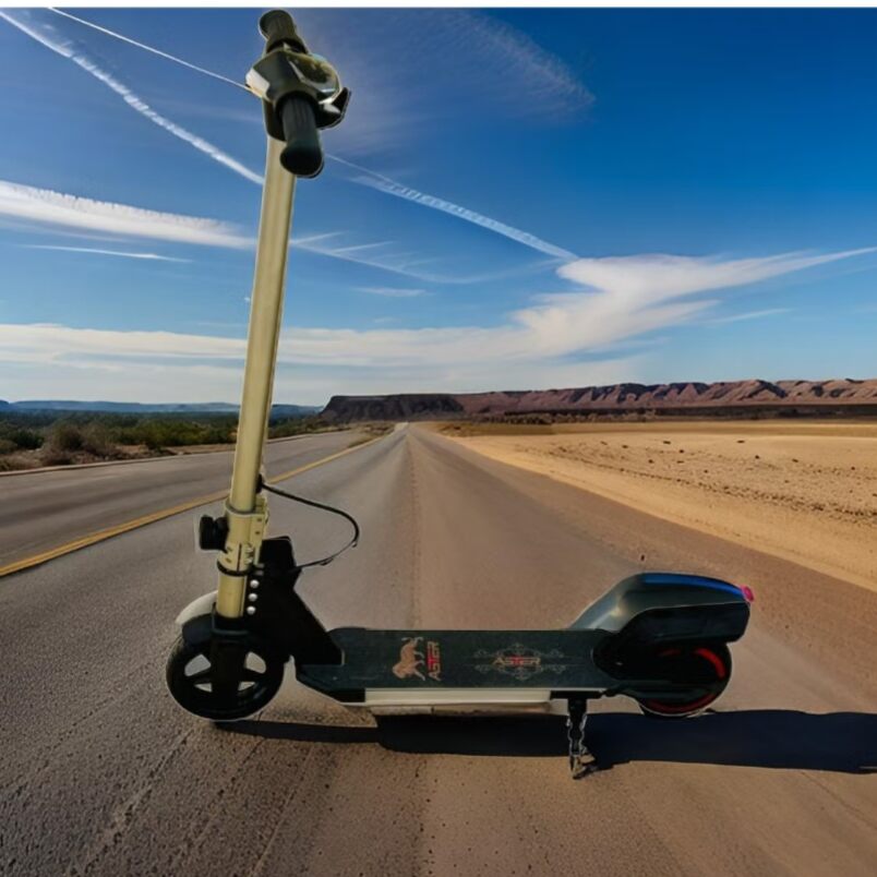 Huitich high powered kids scooter 180w with black and silver frame parked on desert road