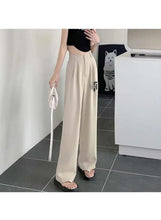 Beige high-rise lightweight trousers with front pleats and wide-leg fit