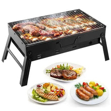 Portable charcoal grill with square cooking grate, open body, showing grilled food
