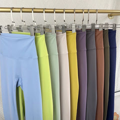 Mumzar high waist push up leggings for women in various colors hanging on display