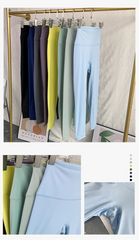 Mumzar high waist yoga leggings UAE in various colors hanging on a display rack