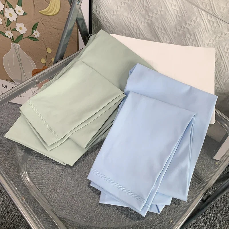Mumzar high waist yoga leggings UAE in light blue and green colors, perfect for comfort and style