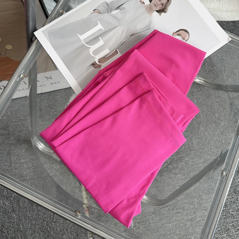 Mumzar high waist yoga leggings UAE in vibrant pink, perfect for yoga and fitness activities