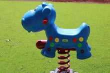 Blue hippo spring ride toy with red spring and green/yellow control dots