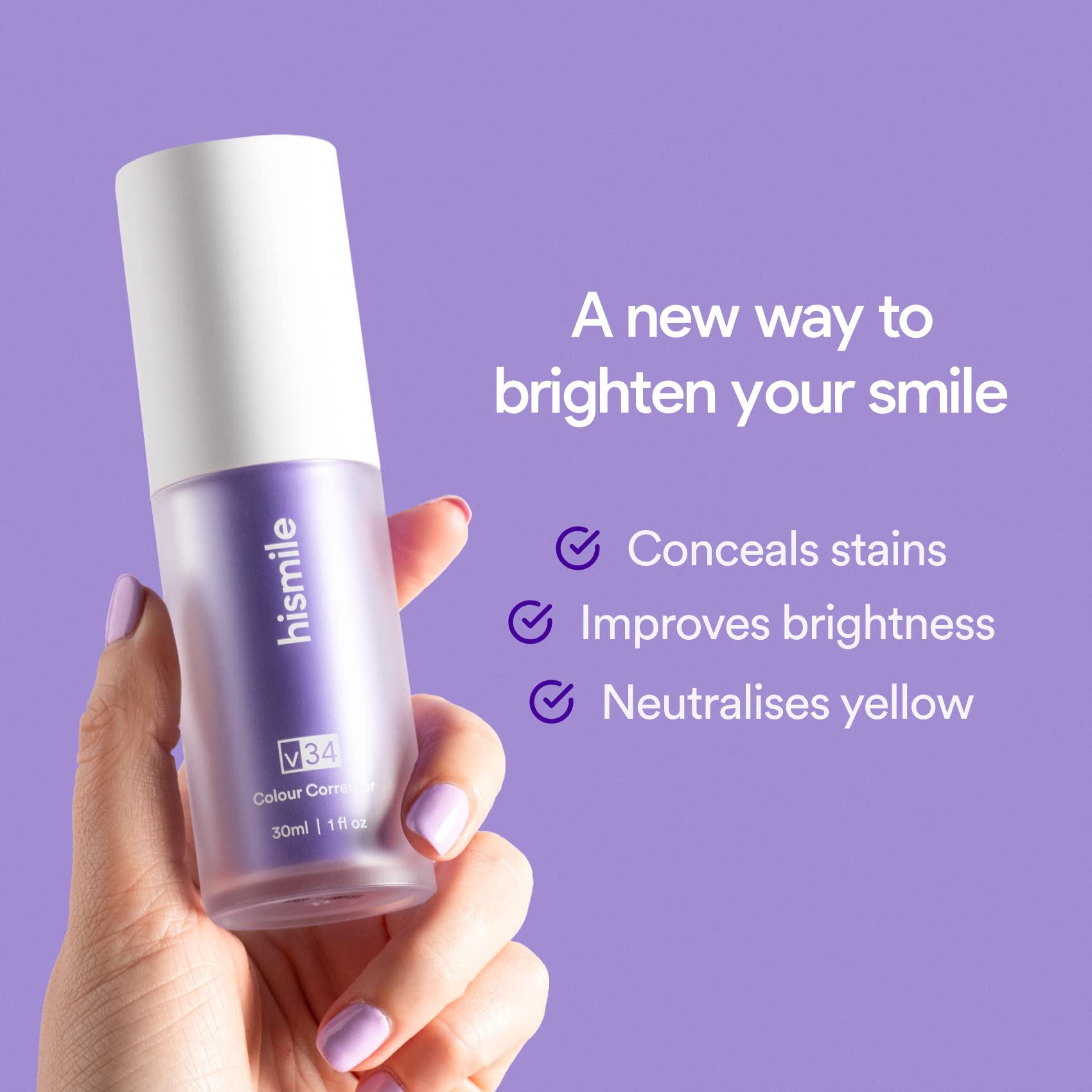 Hand holding Hismile v34 Colour Corrector purple bottle against lavender background showing product name and benefits