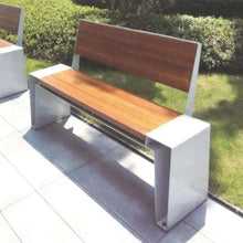 Outdoor wood slat bench with gray metal frame and backrest