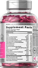Clear bottle of pink softgel capsules with supplement facts label hair skin and nails vitamins with biotin