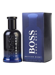 Hugo Boss Bottled Night EDT 100ml in a sleek black bottle with a blue gradient and elegant packaging